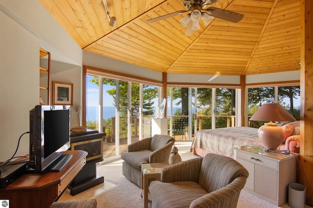 carpeted bedroom featuring lofted ceiling, wooden ceiling, and access to exterior