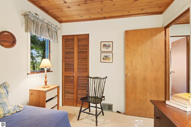 bedroom featuring a closet and wood ceiling