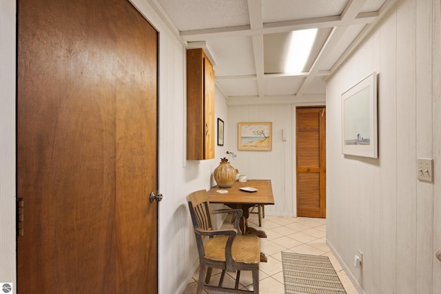 hall with light tile patterned flooring