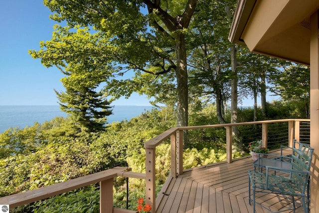 deck featuring a water view