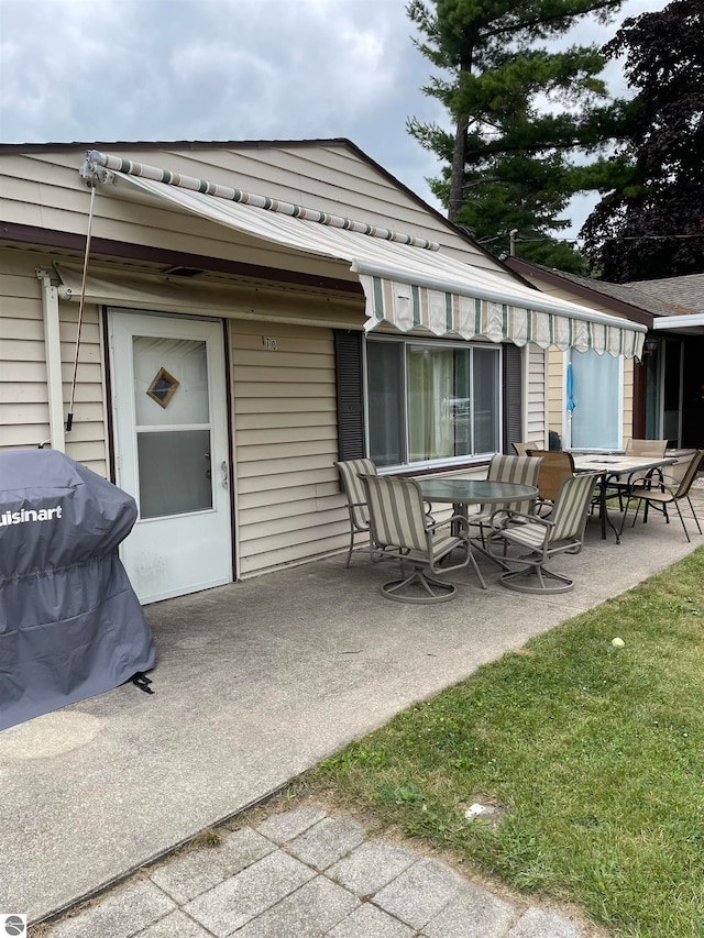 back of property with a patio area