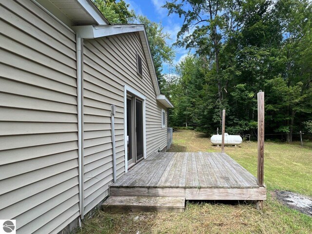 deck featuring a lawn