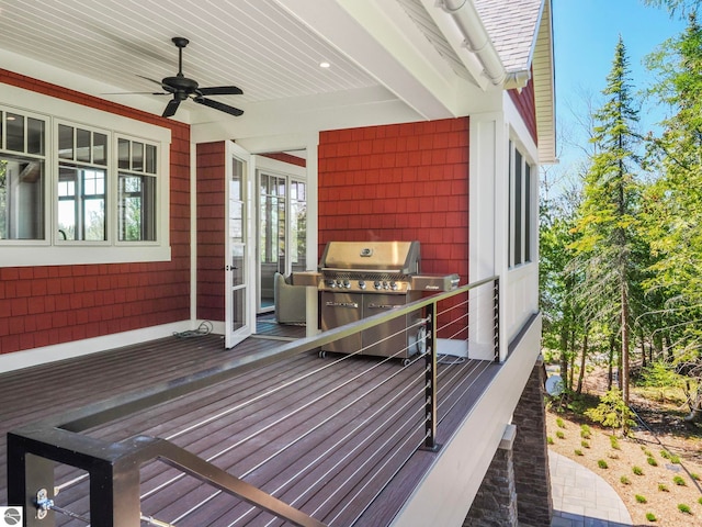 11305 Evergreen, Charlevoix, MI 49720 - wooden terrace with ceiling fan and grilling area