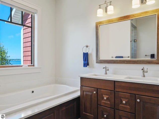 11305 Evergreen, Charlevoix, MI 49720 - bathroom with a bath and double vanity