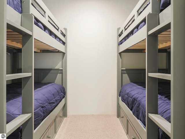 bedroom with light colored carpet