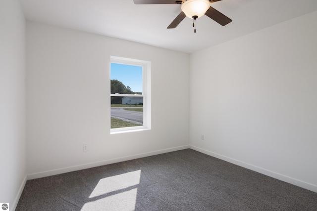 unfurnished room featuring carpet floors and ceiling fan