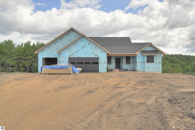 property under construction with a garage