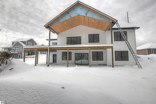 view of snow covered property