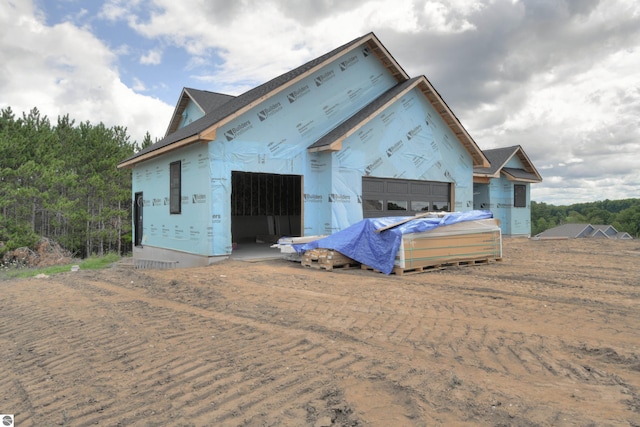 property under construction with a garage