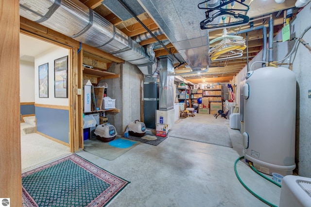 basement with heating unit and electric water heater