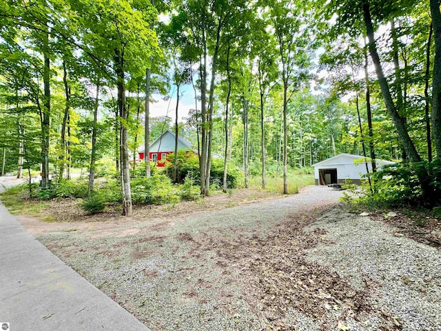 exterior space with an outdoor structure and a garage