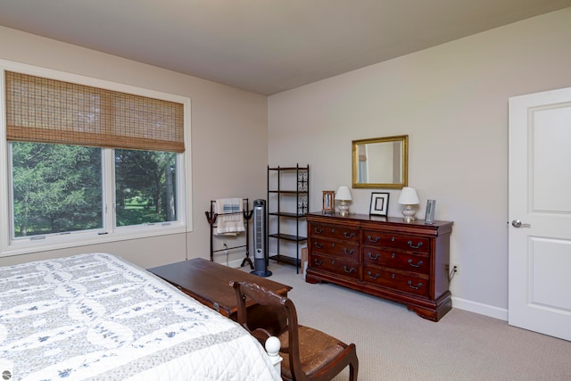 bedroom with light carpet