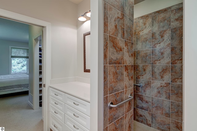 bathroom featuring tiled shower