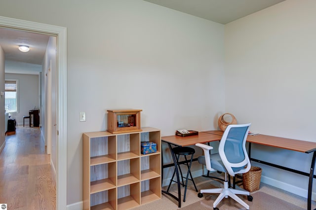 office area with light wood-type flooring