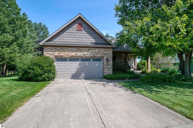 view of front facade featuring a garage and a front lawn