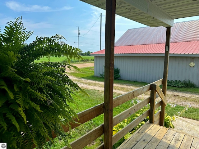 deck featuring a yard