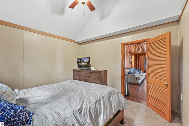 bedroom featuring high vaulted ceiling, ceiling fan, and hardwood / wood-style flooring