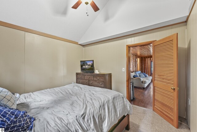 7504 W Dakota Trl, Lake City, MI 49663 - bedroom with carpet floors, high vaulted ceiling, and a ceiling fan