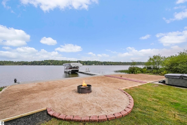 exterior space with a boat dock and a water view