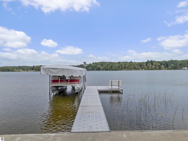 7504 W Dakota Trl, Lake City, MI 49663 - view of dock with a water view and boat lift