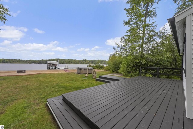 7504 W Dakota Trl, Lake City, MI 49663 - wooden terrace with a lawn and a dock