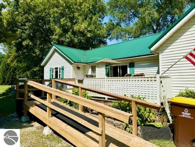 rear view of house with a deck