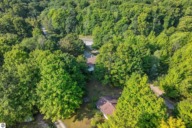 aerial view with a wooded view