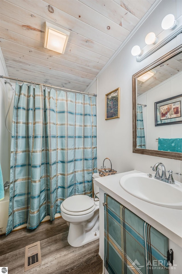 4949 N M-33, Rose City, MI 48654 - full bathroom with visible vents, toilet, wood finished floors, wooden ceiling, and vanity