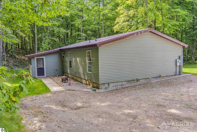 4949 N M-33, Rose City, MI 48654 - exterior space featuring a forest view