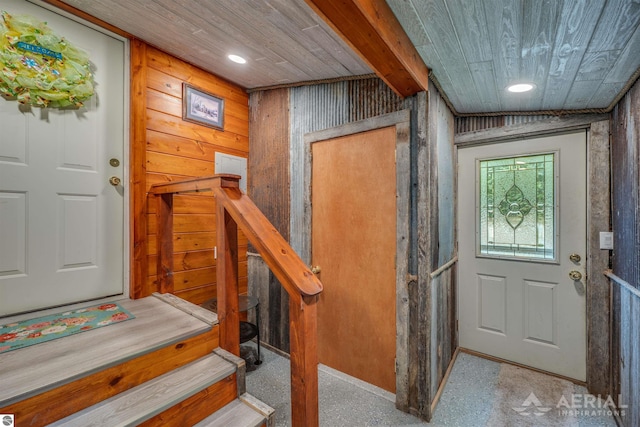 4949 N M-33, Rose City, MI 48654 - entryway with beam ceiling, wooden walls, recessed lighting, and wood ceiling