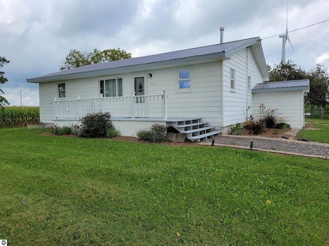 exterior space with a yard