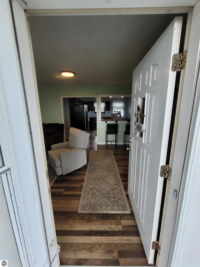 interior space with dark hardwood / wood-style floors