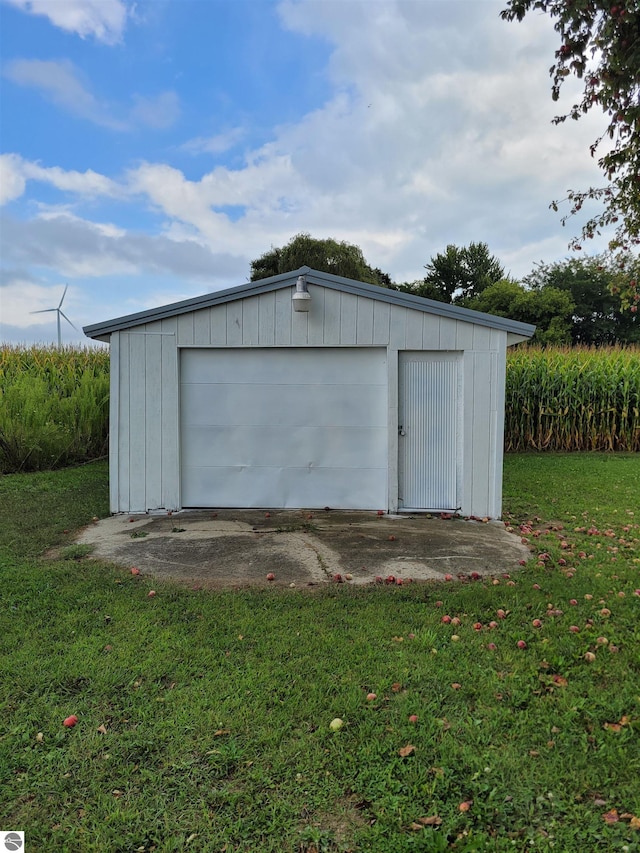 garage featuring a yard