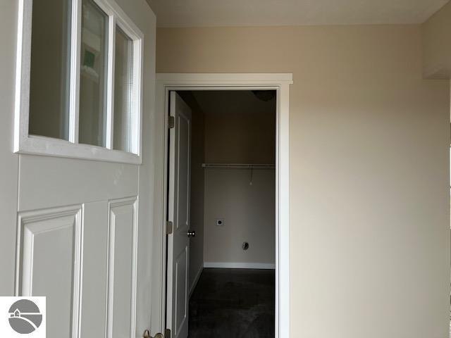 9217 Kingsfield Dr Unit 9, Kingsley, MI 49649 - hallway featuring baseboards