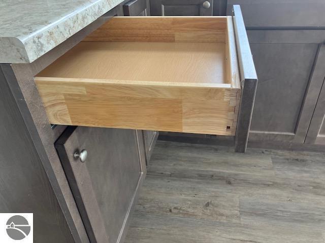 9217 Kingsfield Dr Unit 9, Kingsley, MI 49649 - details featuring wood finished floors