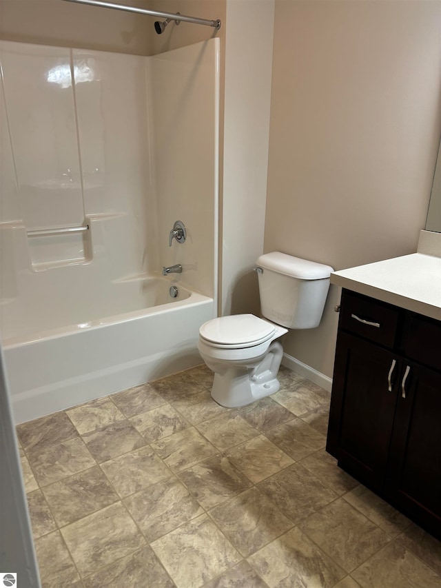 full bathroom with vanity, toilet, and washtub / shower combination