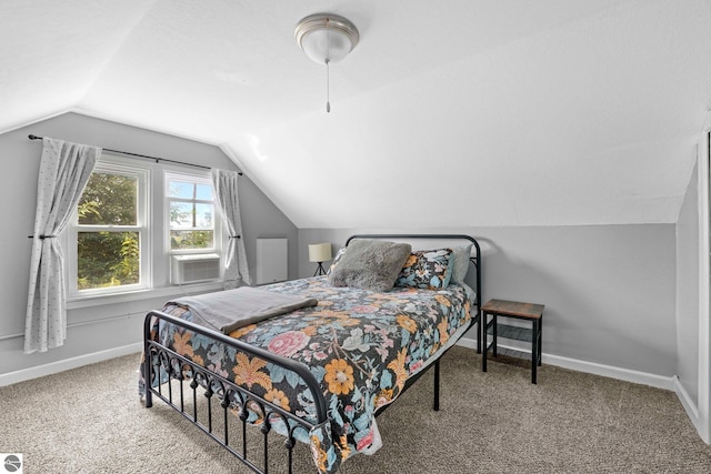 bedroom featuring cooling unit, carpet flooring, and vaulted ceiling