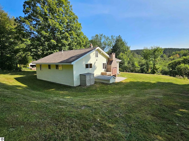 view of home's exterior featuring a yard