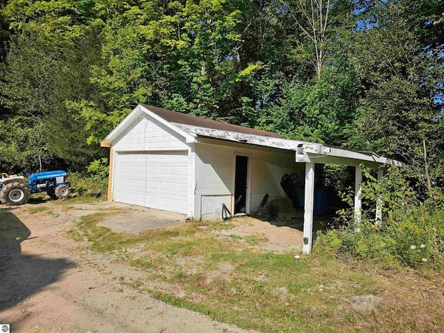 garage with a carport