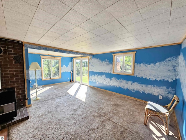 interior space featuring carpet flooring and a fireplace