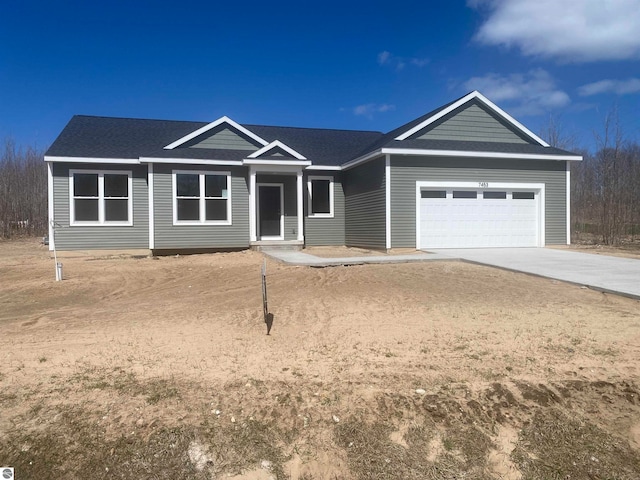 ranch-style home with a garage