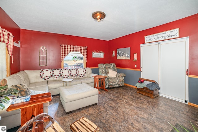 living room with a textured ceiling