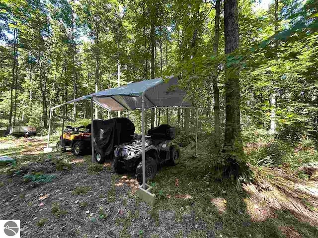 exterior space with a carport