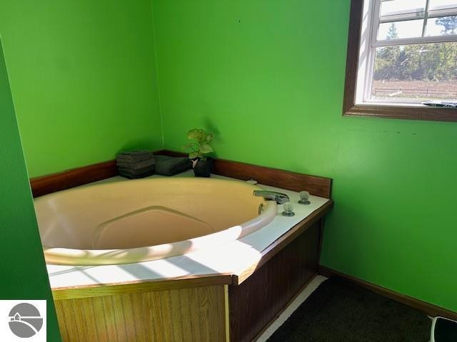 bathroom featuring a bathing tub