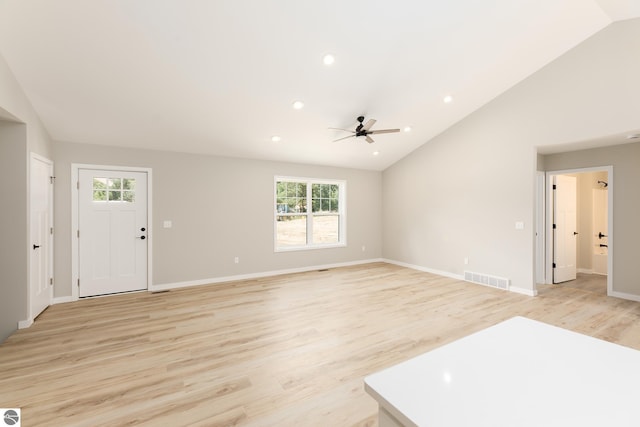 unfurnished living room featuring lofted ceiling, recessed lighting, visible vents, baseboards, and light wood finished floors