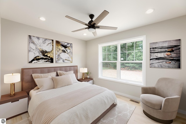 bedroom featuring a ceiling fan, recessed lighting, visible vents, and baseboards