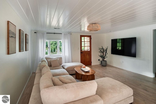 living room featuring wood ceiling and hardwood / wood-style floors