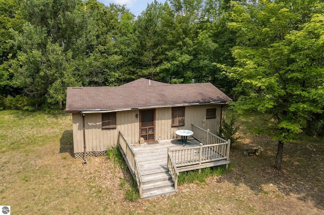 view of front of home with a wooden deck