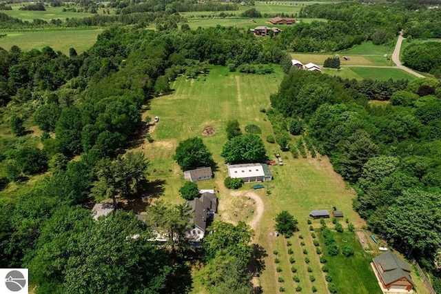 birds eye view of property featuring a rural view