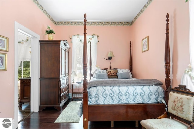 bedroom featuring dark hardwood / wood-style floors